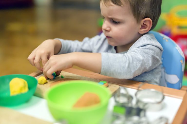 little-boy-working-with-clay.jpg